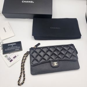 Authentic Chanel classic clutch with chain handle/wrislet